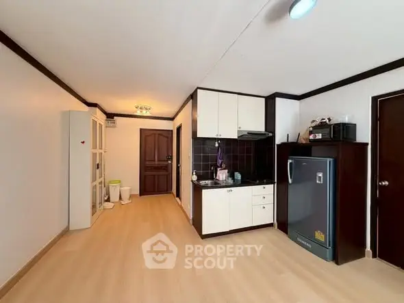 Spacious kitchen with modern appliances and sleek cabinetry