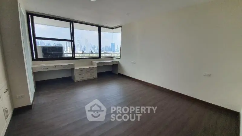 Spacious corner unit with stunning city view and elegant flooring, perfect for modern living.