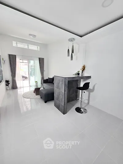 Modern living room with sleek bar counter and stylish decor