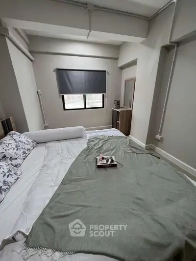 Cozy bedroom with modern decor and natural light