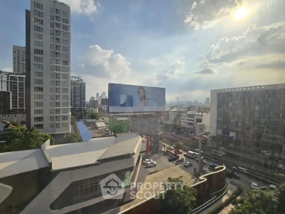 Stunning cityscape view from a high-rise building showcasing urban architecture and skyline.
