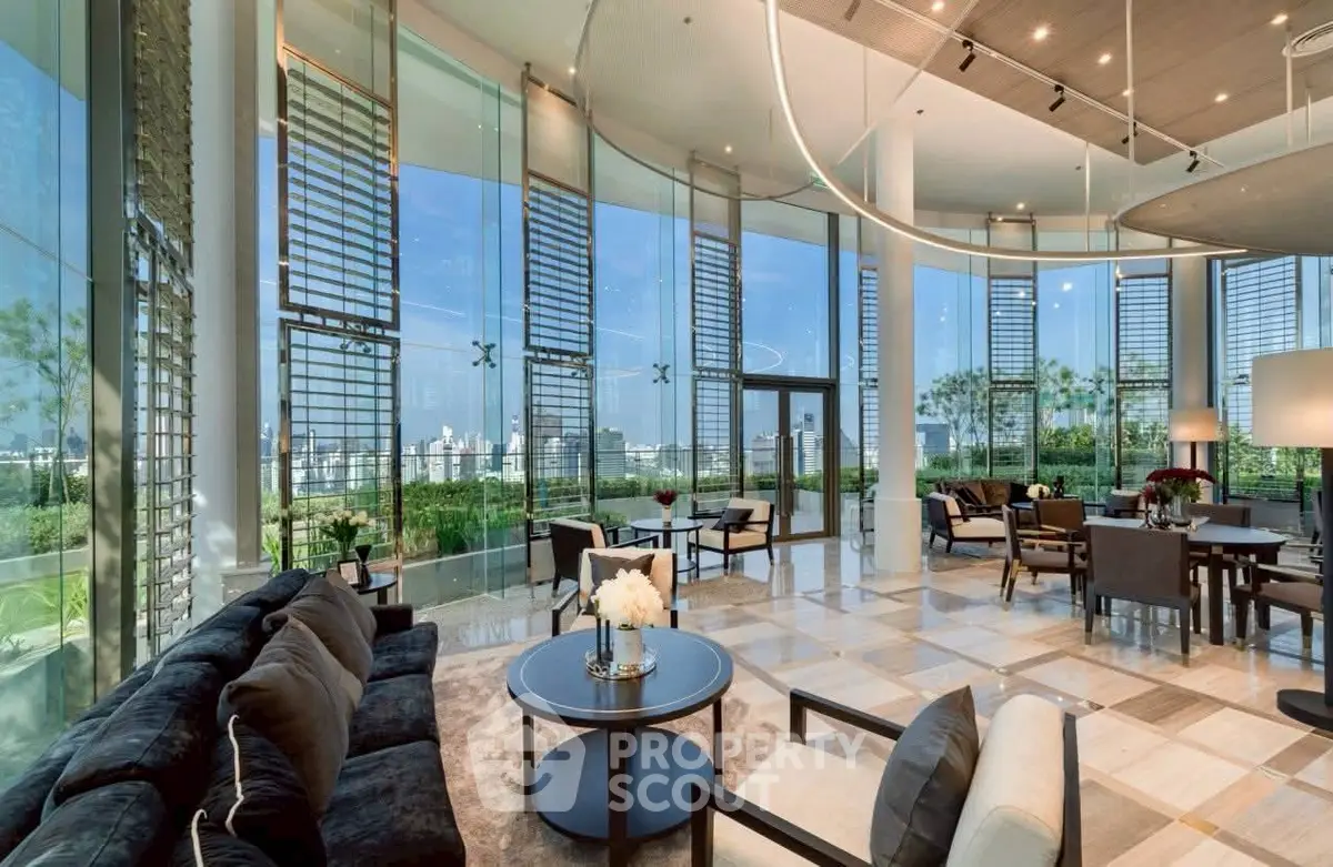 Luxurious modern living room with floor-to-ceiling windows and stunning city views.