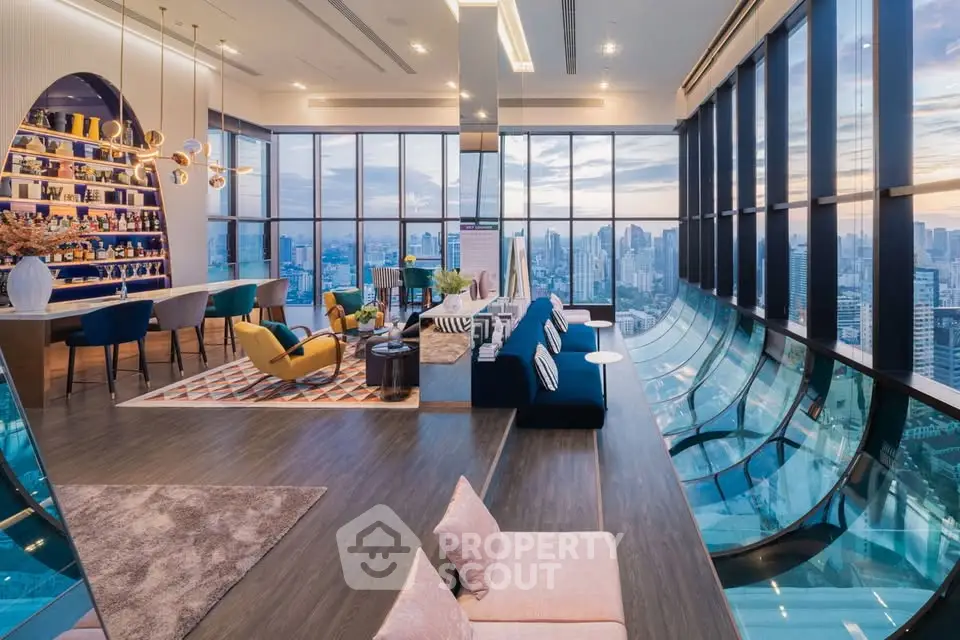 Luxurious high-rise living room with panoramic city views and modern decor