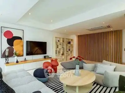 Modern living room with stylish decor and cozy seating area