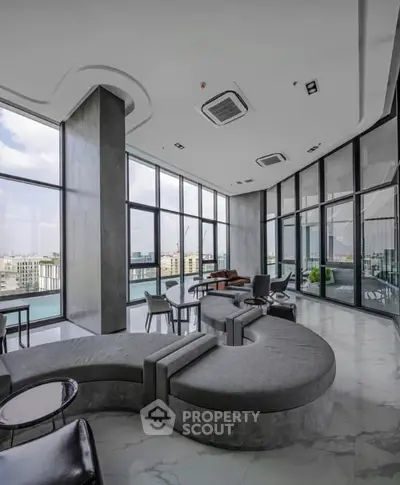 Luxurious modern living room with panoramic city views and sleek contemporary design.