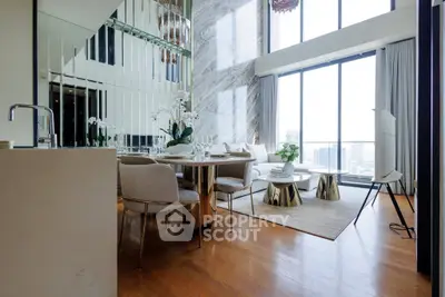 Luxurious modern living room with high ceilings and city view, featuring elegant dining area and stylish decor.