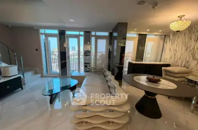 Luxurious modern living room with unique furniture and stunning city view