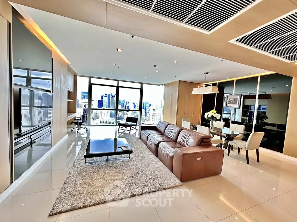 Luxurious modern living room with stunning city view and elegant furnishings.