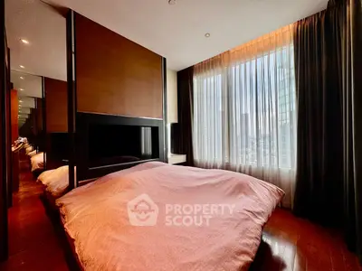 Luxurious bedroom with floor-to-ceiling windows and city view