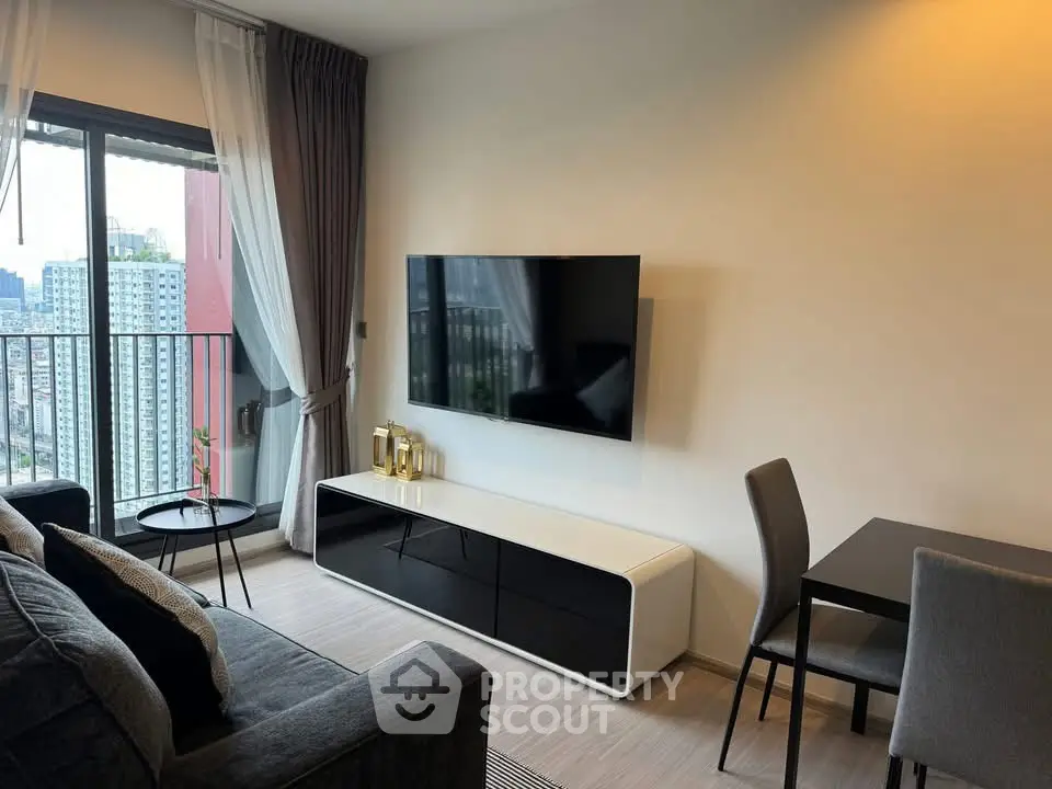 Modern living room with sleek furniture and city view balcony