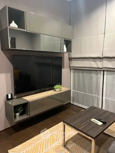 Modern living room with sleek TV unit and stylish decor