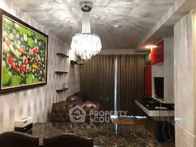 Luxurious living room with elegant chandelier and stylish decor