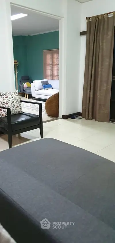 Spacious living room with modern furniture and cozy ambiance