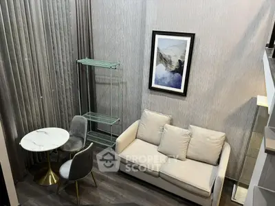 Modern living room with elegant decor and cozy seating area
