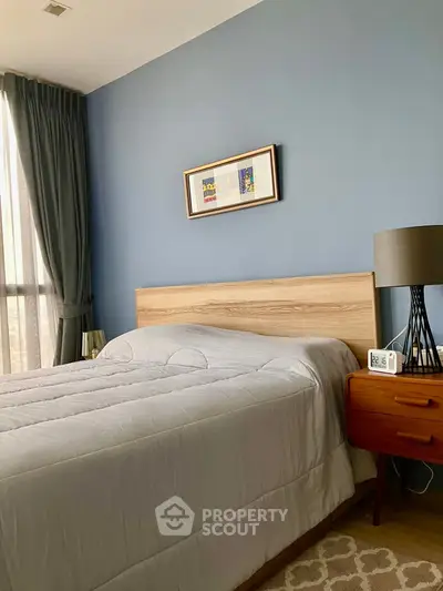 Cozy bedroom with modern decor and natural light