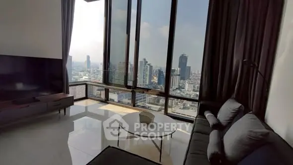 Luxurious living room with panoramic city view and modern furnishings.