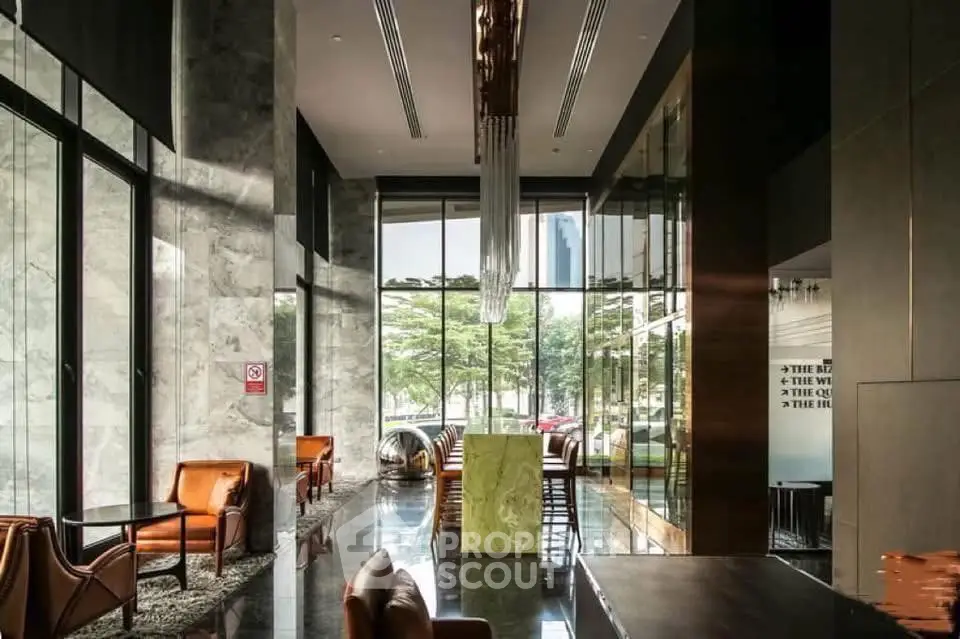 Luxurious modern lobby with high ceilings and elegant furnishings