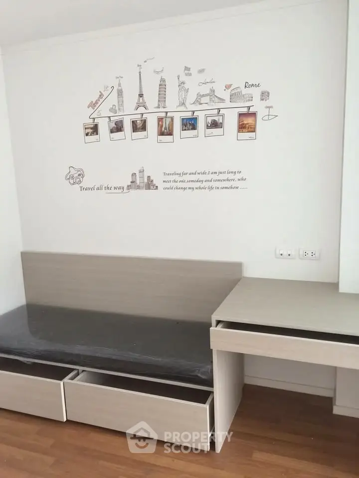 Modern bedroom with stylish wall art and sleek furniture design