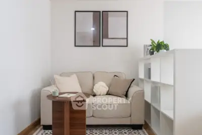 Cozy living room with modern decor and stylish furniture, perfect for relaxation.