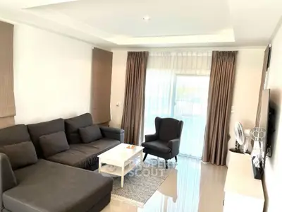 Spacious living room with modern furniture and natural light
