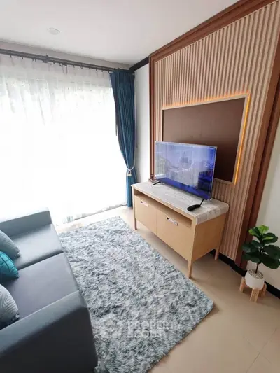 Modern living room with stylish decor and large window