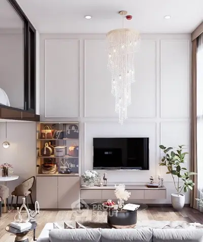 Luxurious living room with elegant chandelier and modern decor, featuring a stylish TV setup and cozy seating area.