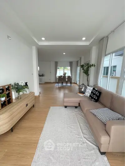 Spacious modern living room with elegant decor and natural light