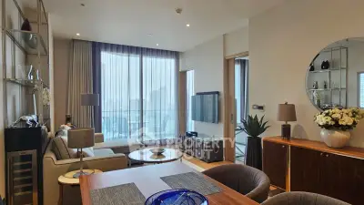 Luxurious modern living room with elegant decor and large windows offering stunning views.