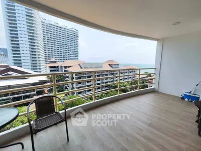 Spacious balcony with stunning ocean view in modern apartment