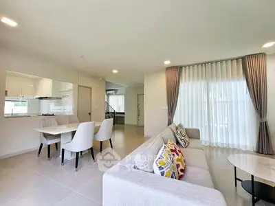 Spacious modern living room with open layout and stylish decor