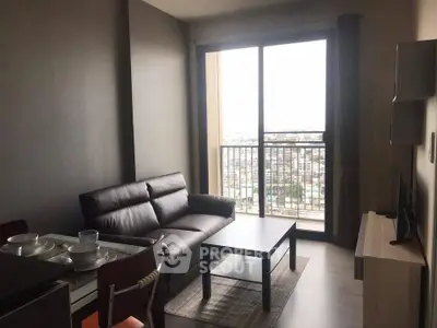 Modern living room with city view, sleek furniture, and natural light.