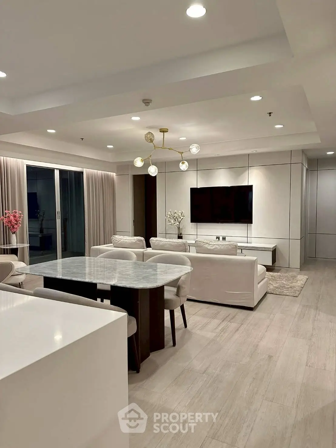 Luxurious modern living room with elegant decor and open layout, perfect for entertaining.
