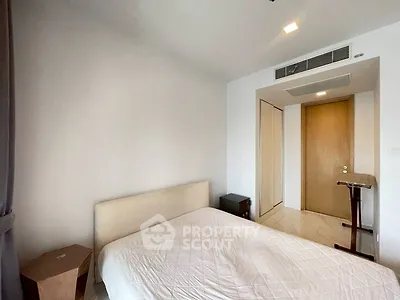 Modern minimalist bedroom with sleek design and neutral tones