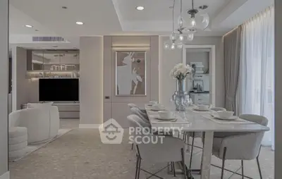 Luxurious modern dining and living area with elegant decor and natural light