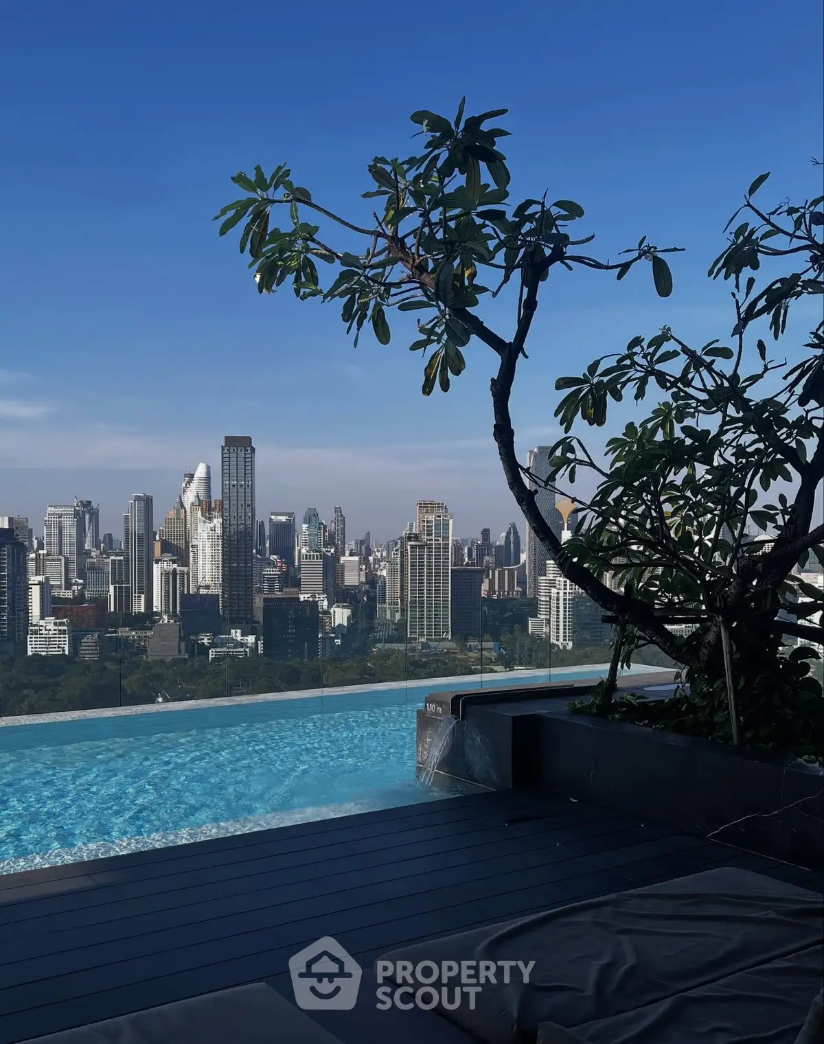 Stunning rooftop pool with breathtaking city skyline view