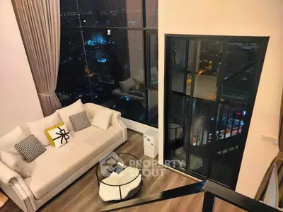 Luxurious high-rise living room with stunning city view and modern decor