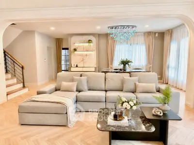 Luxurious living room with elegant decor and spacious seating area