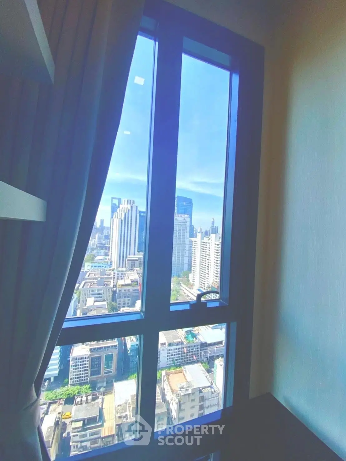 Stunning high-rise city view from modern apartment window