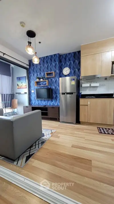 Modern living room with stylish decor and open kitchen layout