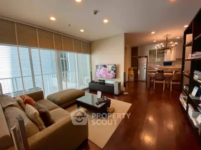 Spacious modern living room with open kitchen and stylish decor