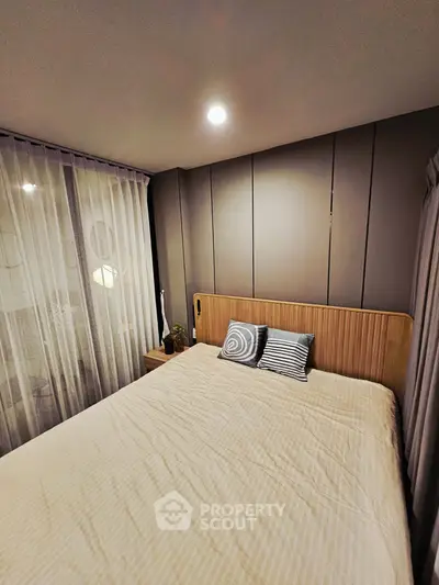 Cozy bedroom with modern decor and soft lighting