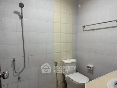 Modern bathroom with shower and toilet in minimalist design