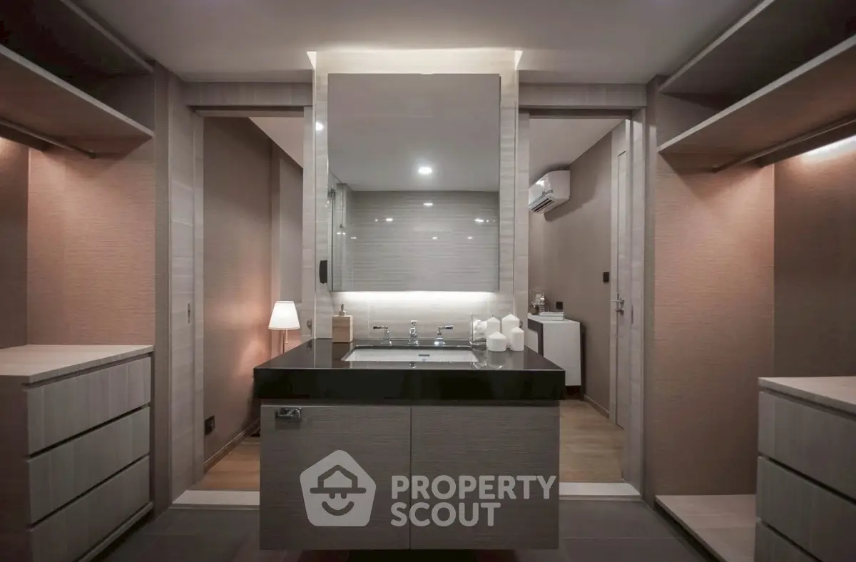 Luxurious modern bathroom with sleek design and ambient lighting