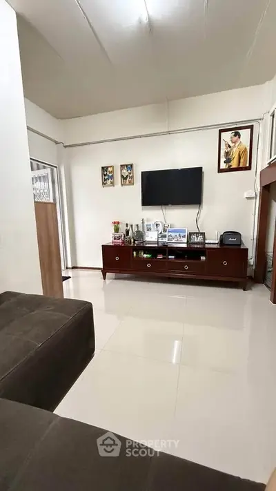 Modern living room with sleek TV setup and stylish decor