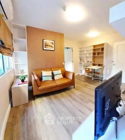 Modern living room with cozy sofa and stylish decor in a bright apartment