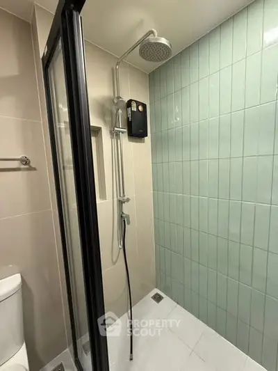 Modern bathroom with sleek shower and stylish tiles