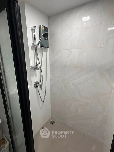 Modern bathroom with sleek shower design and elegant tile work