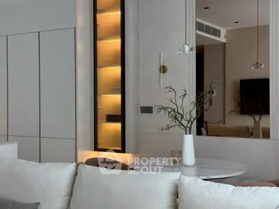 Modern living room with elegant decor and ambient lighting