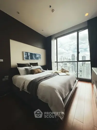 Luxurious bedroom with stunning city view and modern decor