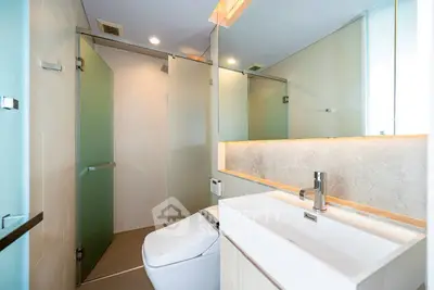 Modern bathroom with sleek design and glass shower enclosure